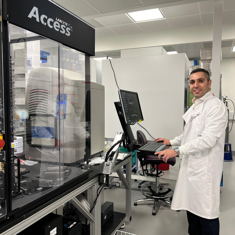 Photo of Mootaz Salman working in the lab.
