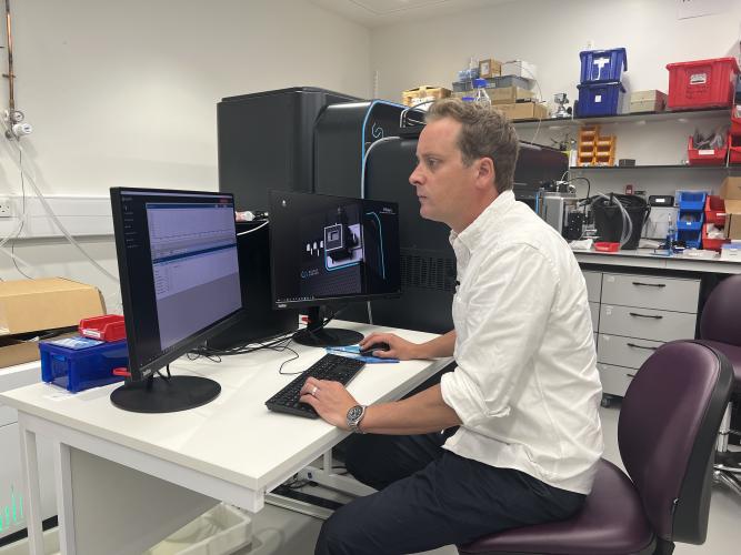 Weston working at the mass spec lab