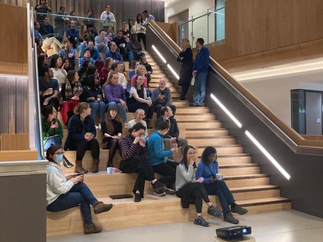 sleep talk audience sitting on the stairs of the atrium