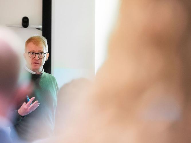 Professor Matt Higgins giving the keynote lecture, titled 'The application of nanoscience to malaria vaccine design', at the 5th birthday symposium held by Oxford's Kavli Institute for Nanoscience Discovery.