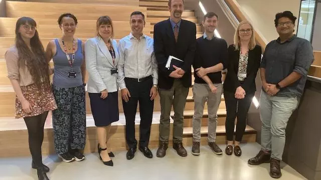 Image of the Kavli Foundation representative with the Kavli Oxford Team