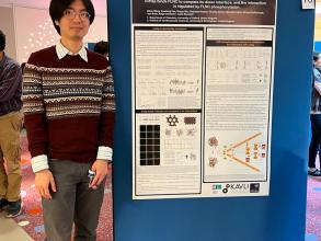 A picture of Zihao Wang with his poster.