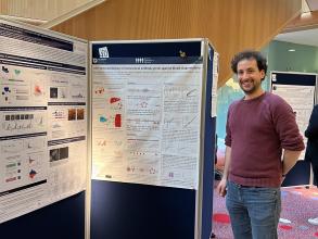 A photograph of Martino Bardelli with his poster.