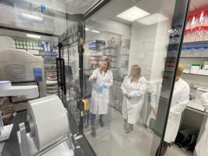 Sarah Pearce giving the tour to the Alzheimer's Research UK